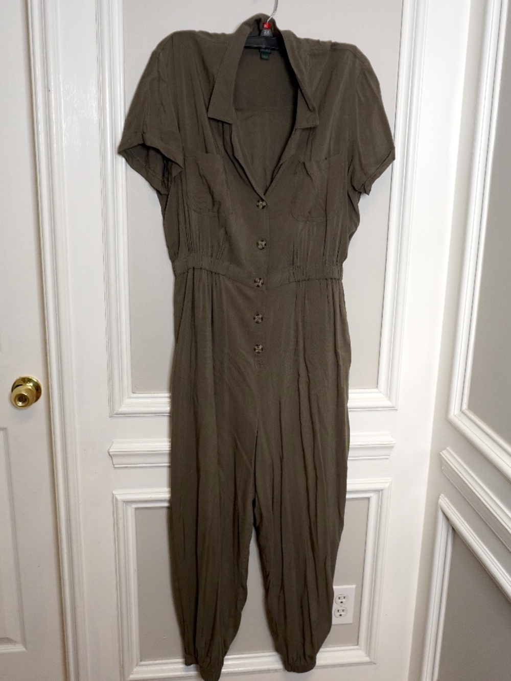 Wild Fable jumpsuit in olive green features a collared V-neckline and a button